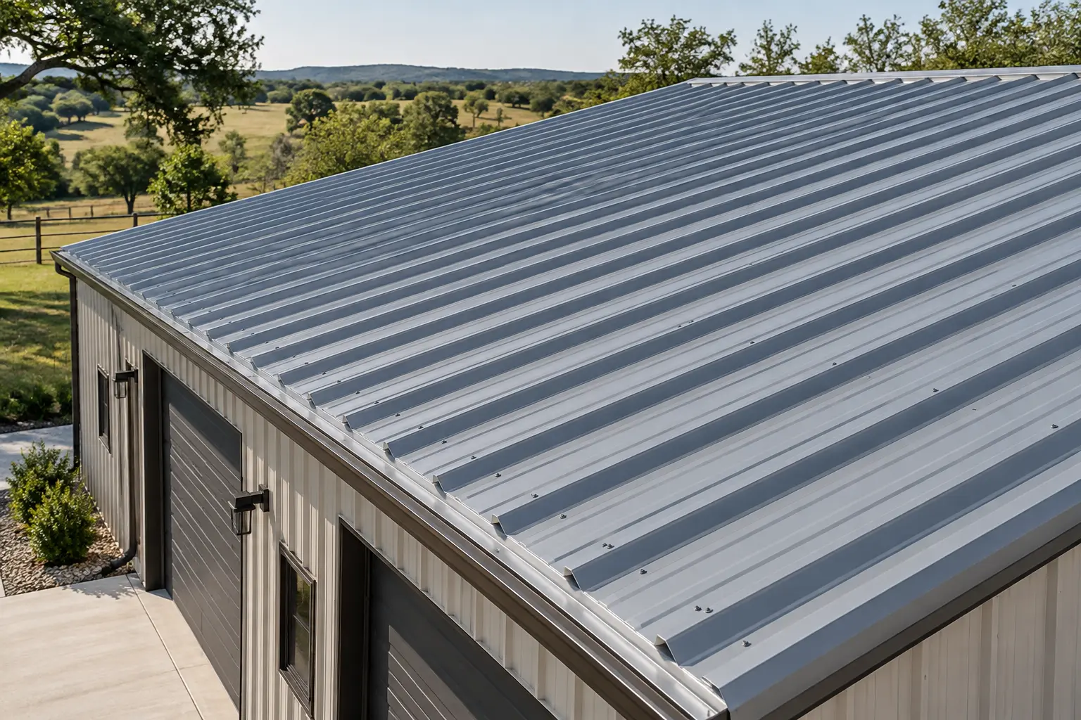 Gray R-panel metal roof with raised ribs and exposed fasteners