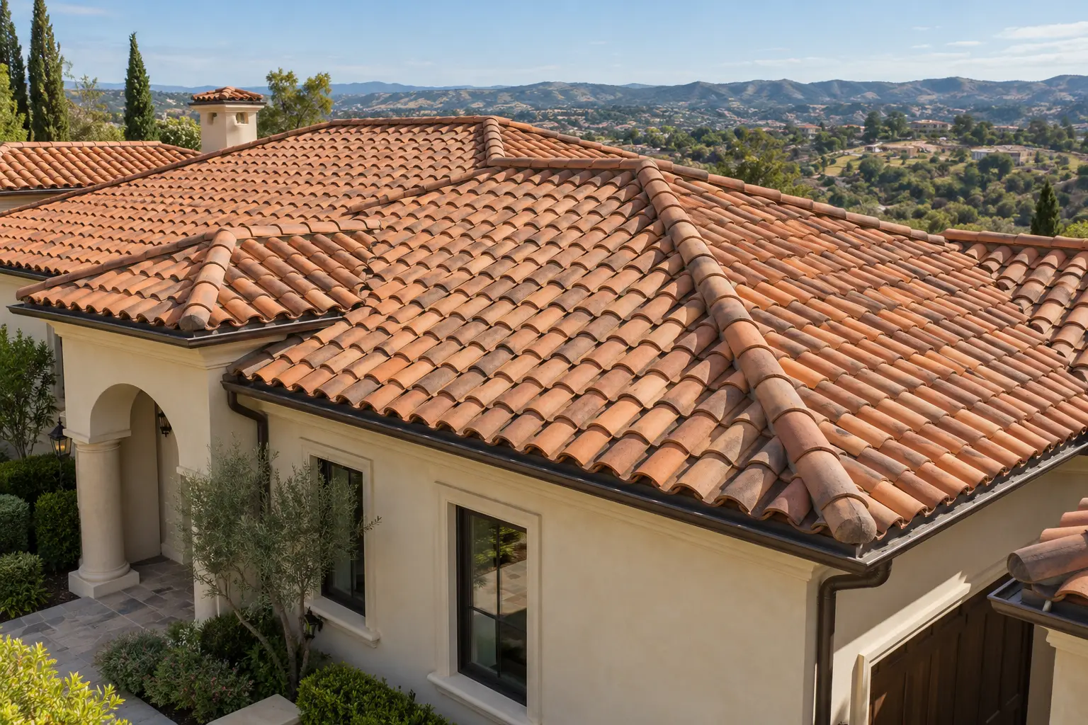 Terracotta barrel tile roof on a stucco home